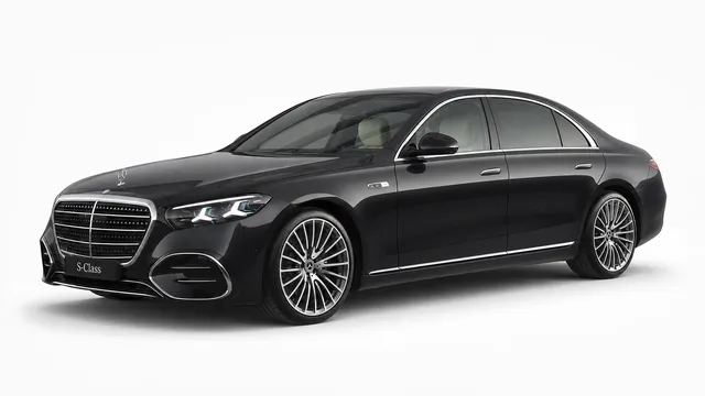 Black 2026 Mercedes-Benz S-Class in a front three-quarter studio view — First Class, chauffeur-driven fleet