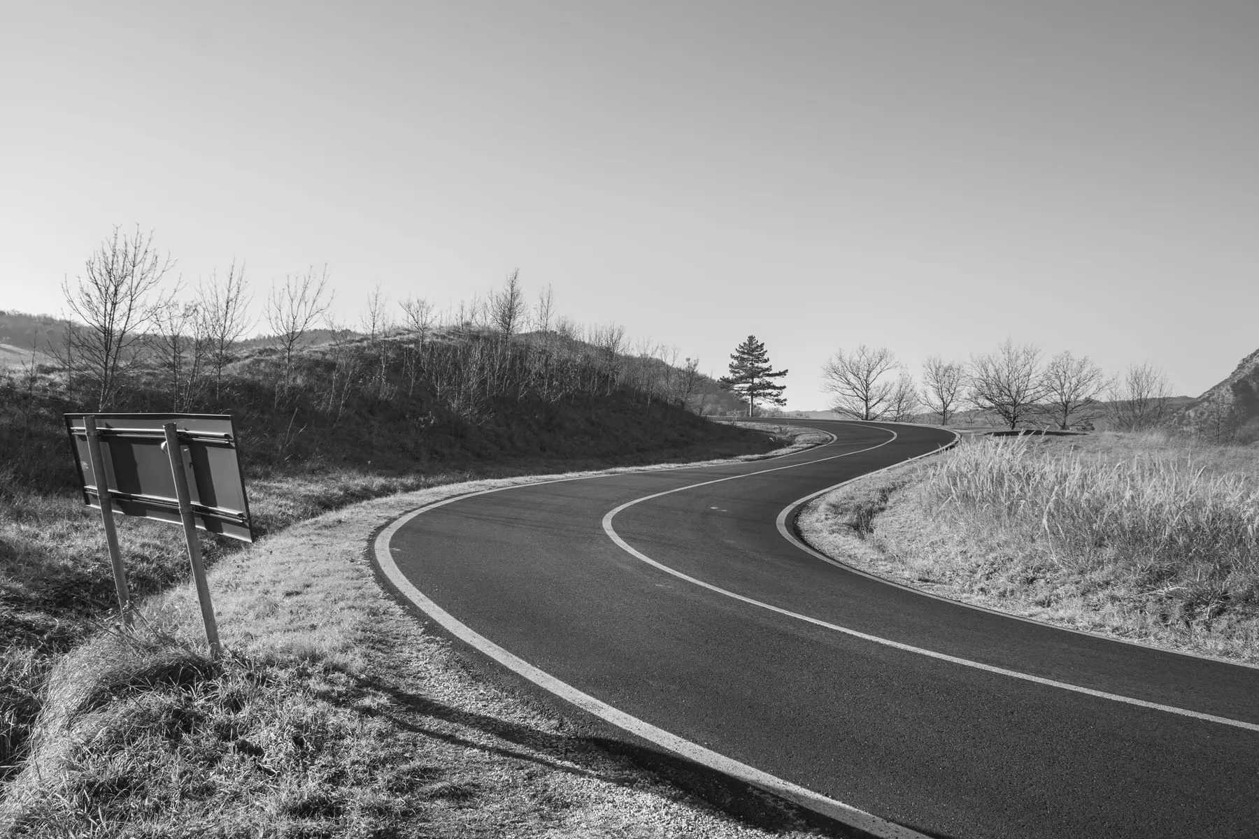 An open motorway curving through countryside — Multi-Day Chauffeur Service Frankfurt & Europe