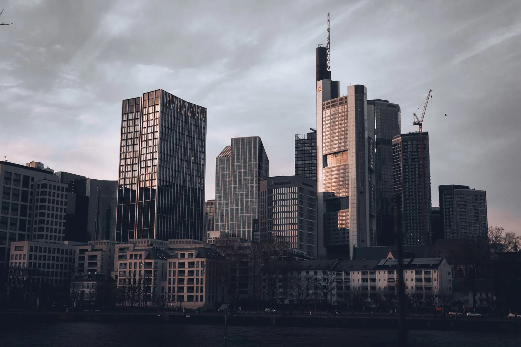 The Frankfurt banking district skyline at dusk — Corporate Chauffeur & Business Transport Frankfurt